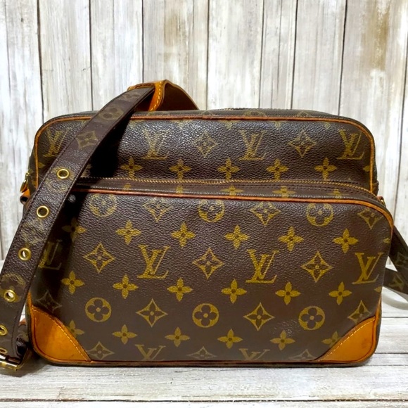 Monogram Louis Vuitton Nile Crossbody - Picture 1 of 11